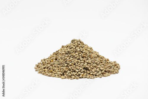 Fraction of feed additives for animals on a white background in the form of a pyramid