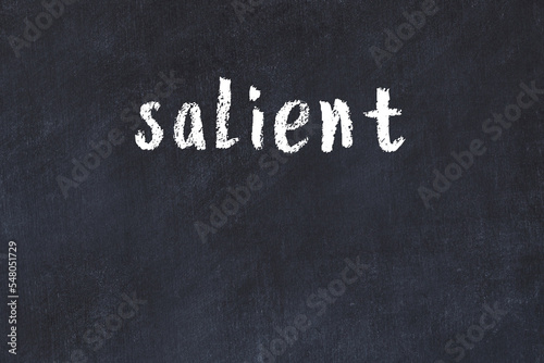 Black chalkboard with inscription salient on in