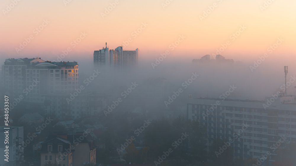 Φωτογραφία View of the city Truskavets in the morning of a foggy day.