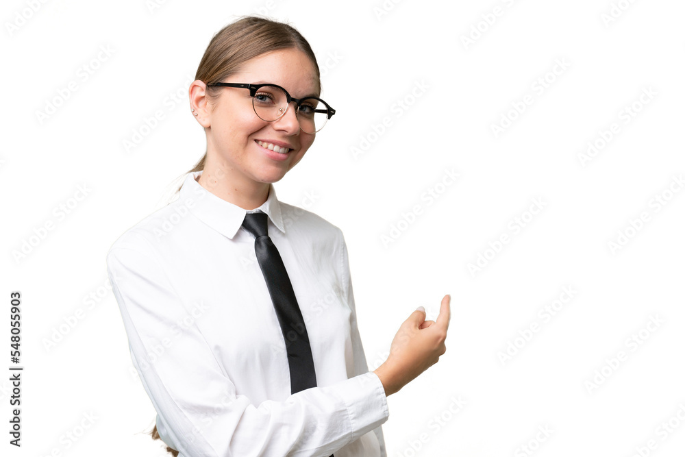 Young business caucasian woman over isolated background pointing back Young business caucasian woman over isolated background pointing back