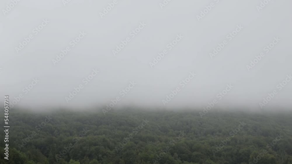 Vitoria-Gasteiz, Basque Country Spain. August 25, 2022. Fog and mist moving over trees on the mountain Vitoria-Gasteiz, Basque Country Spain. August 25, 2022. Fog and mist moving over trees on the mountain