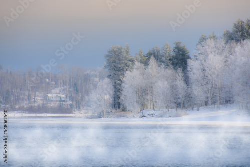 Fototapeta Naklejka Na Ścianę i Meble -  Canadian forest lake after the first snows of November. Province of Quebec