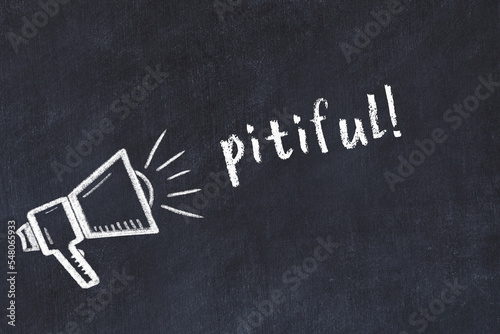 Photography Chalk sketch of loudspeaker and inscription pitiful