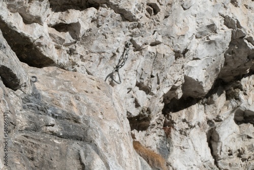 rock climbing limestone cliff in dolomites