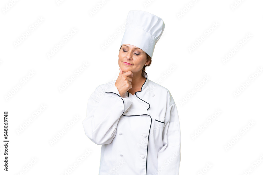 Middle-aged chef woman over isolated background looking to the side Middle-aged chef woman over isolated background looking to the side