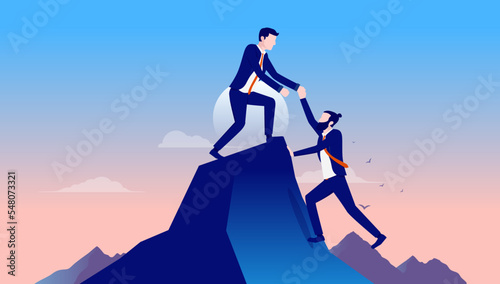 Business support and help - Businessman giving a helping hand to person trying to get up on top of mountain. Teamwork and supportive colleagues concept. Vector illustration photo