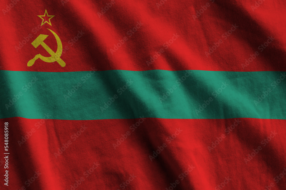 Obraz na płótnie Transnistria flag with big folds waving close up under the studio light indoors. The official symbols and colors in banner w salonie