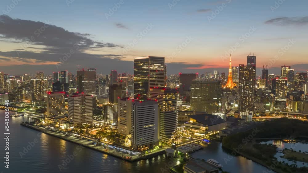 Time Lapse: Sunset over Tokyo and high rise towers on waterfront Time Lapse: Sunset over Tokyo and high rise towers on waterfront
