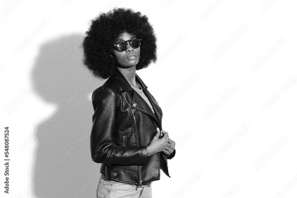 Black and white pictures of fashion model with afro hairstyle. Black and white pictures of fashion model with afro hairstyle.