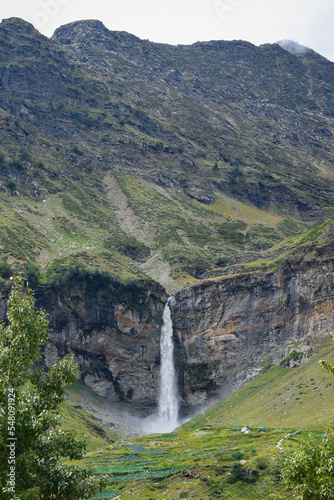 Huge glacier melted water s waterfall falling from height
