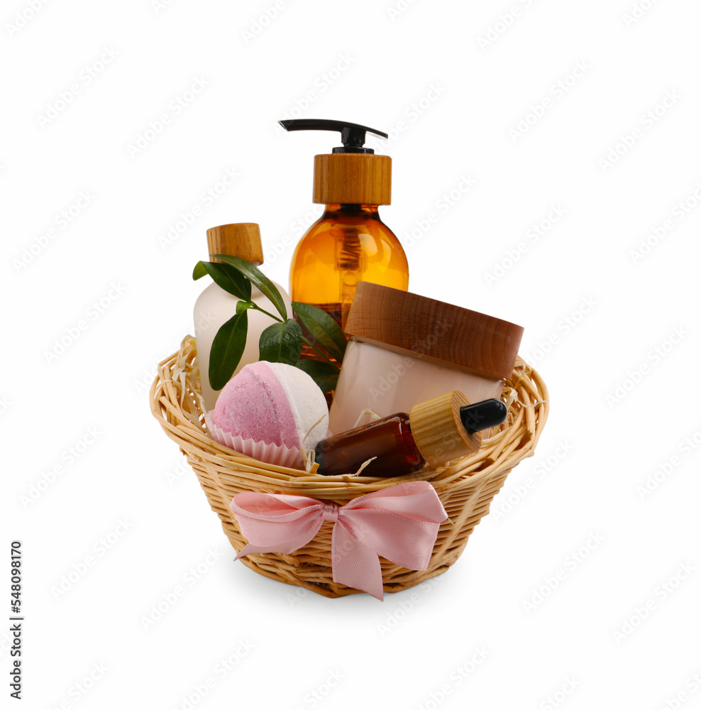 Spa gift set of different luxury products in wicker basket on white background - obrazy, fototapety, plakaty 