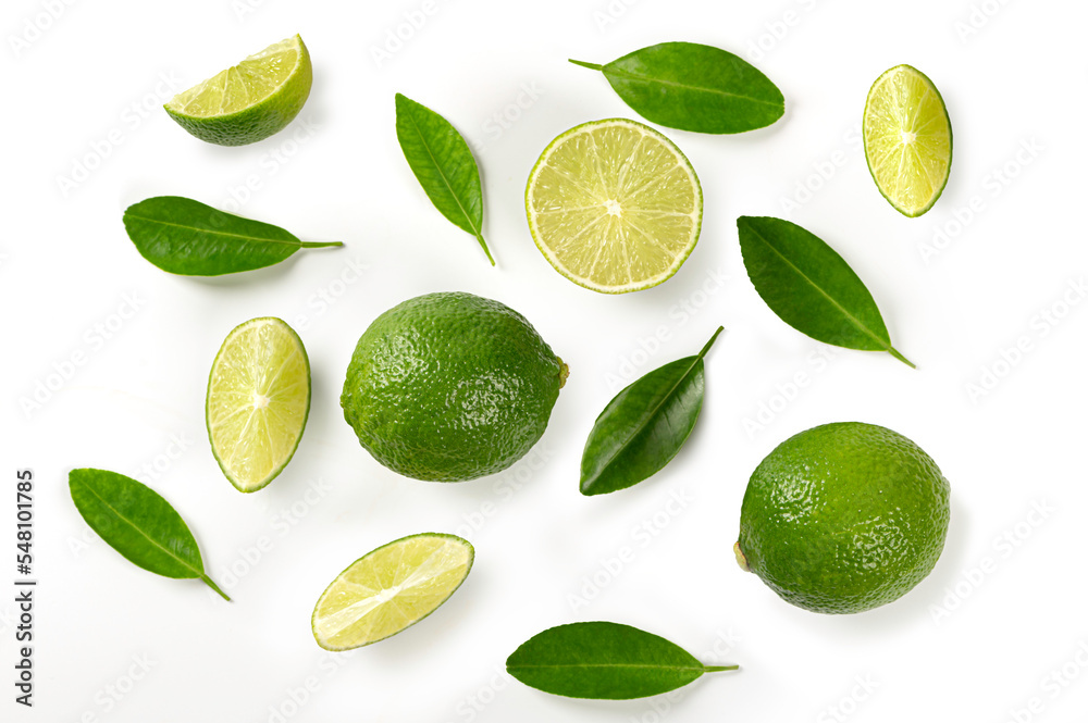Top view of Limes with half and leaves on white background. Top view of Limes with half and leaves on white background.