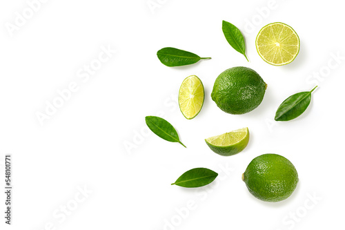 Flat lay, Lime with half, slices and leaves isolated on white background. Top view