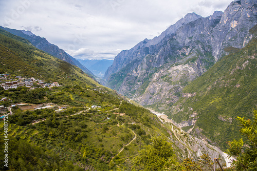 Tiger Leaping gorge between Jade Dragon Mountain or Yulong Mountain and Haba Mountain at Shangri-la, Yunnan China photo