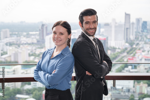 Portrait caucasian business man and woman at the office and city background	