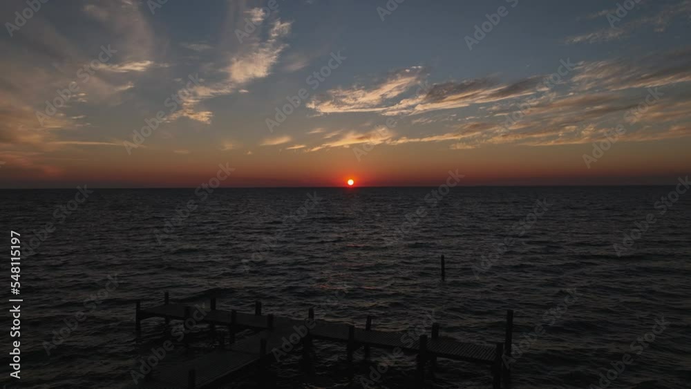 Aerial view of sunset over Mobile Bay near Fairhope Alabama by the yacht club Aerial view of sunset over Mobile Bay near Fairhope Alabama by the yacht club