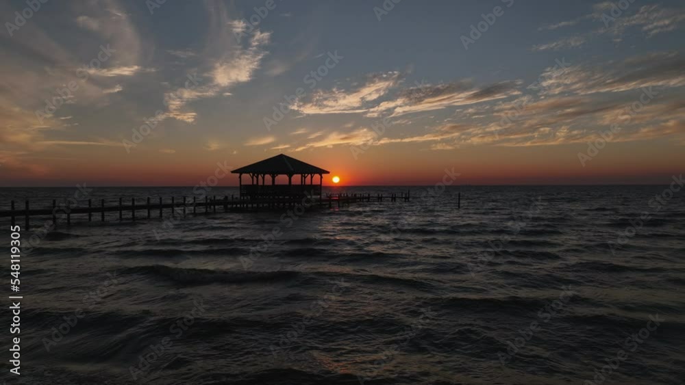 Aerial sunset view near a dock in Fairhope, Alabama Aerial sunset view near a dock in Fairhope, Alabama
