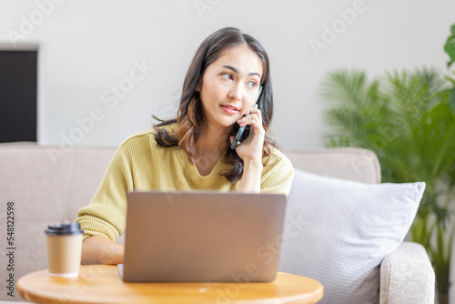 Recruitment Concept. Indian Asian Girl Browsing Work Opportunities Online, Call phone Using Job Search App or Website on Laptop, Copy Space