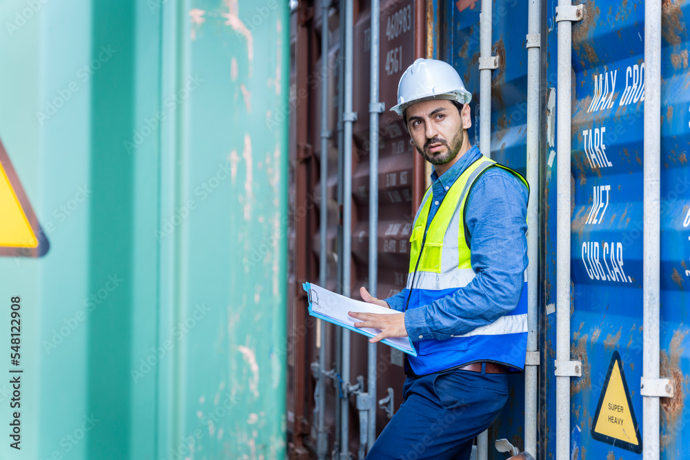 male engineers in a container shipping company Consulting to check the order for the container that is responsible
male engineers in a container shipping company Consulting to check the order for the container that is responsible