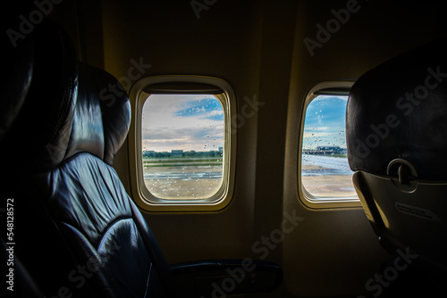 vintage dark tone of seats in economy class passenger on aircraft. Empty airplane seats in the cabin