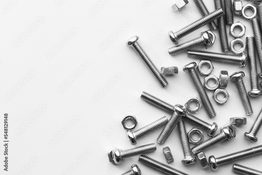 Nuts / Bolts / Screws closeup on white background Nuts / Bolts / Screws closeup on white background