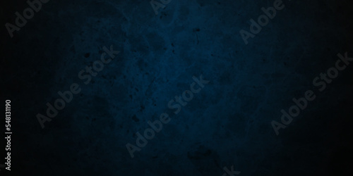 Dark black and blue stone concrete grunge wall texture and backdrop background anthracite panorama. Panorama dark black or blue slate background or texture.   © MdLothfor