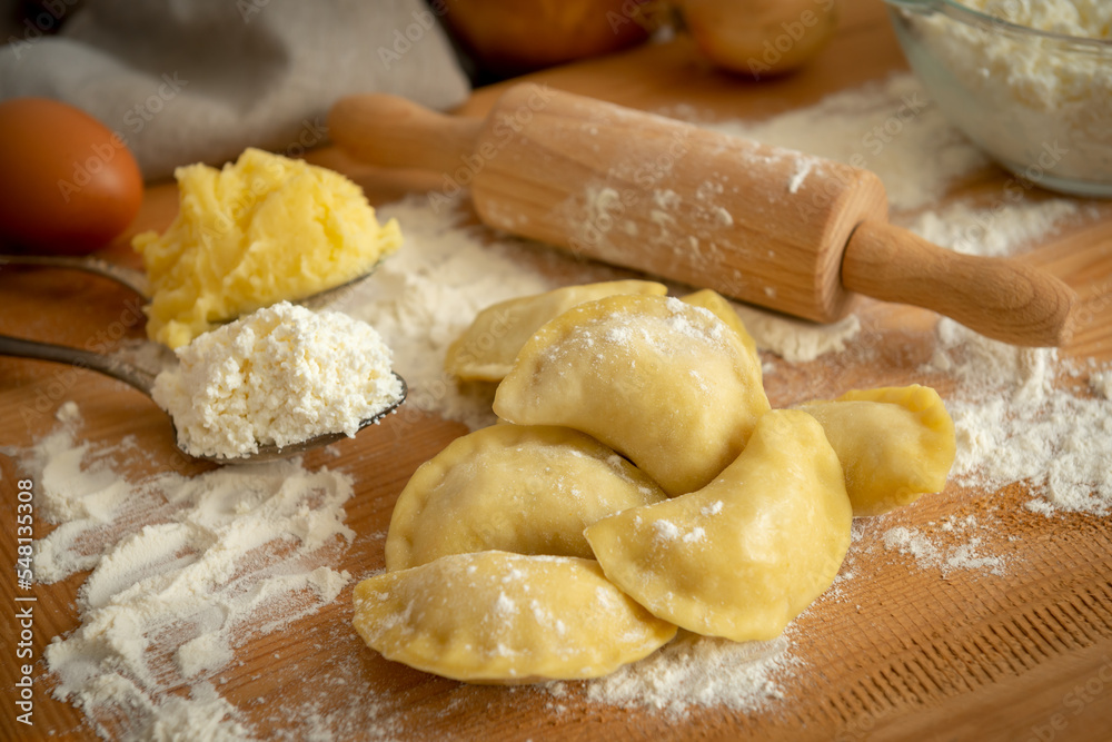 The process of cooking dumplings with potatoes and cottage cheese. Traditional Polish cuisine The process of cooking dumplings with potatoes and cottage cheese. Traditional Polish cuisine