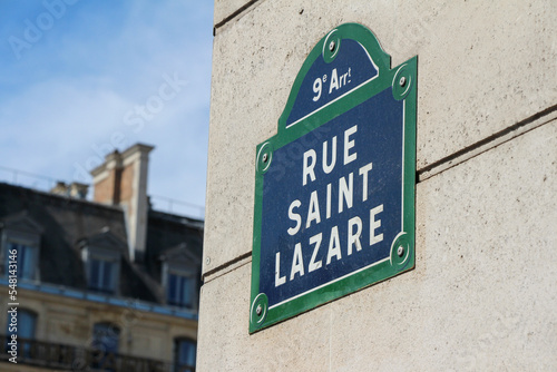 Fototapeta Naklejka Na Ścianę i Meble -  Rue Saint Lazare street sign (Saint Lazare Street), one of the most famous streets in Paris, France.