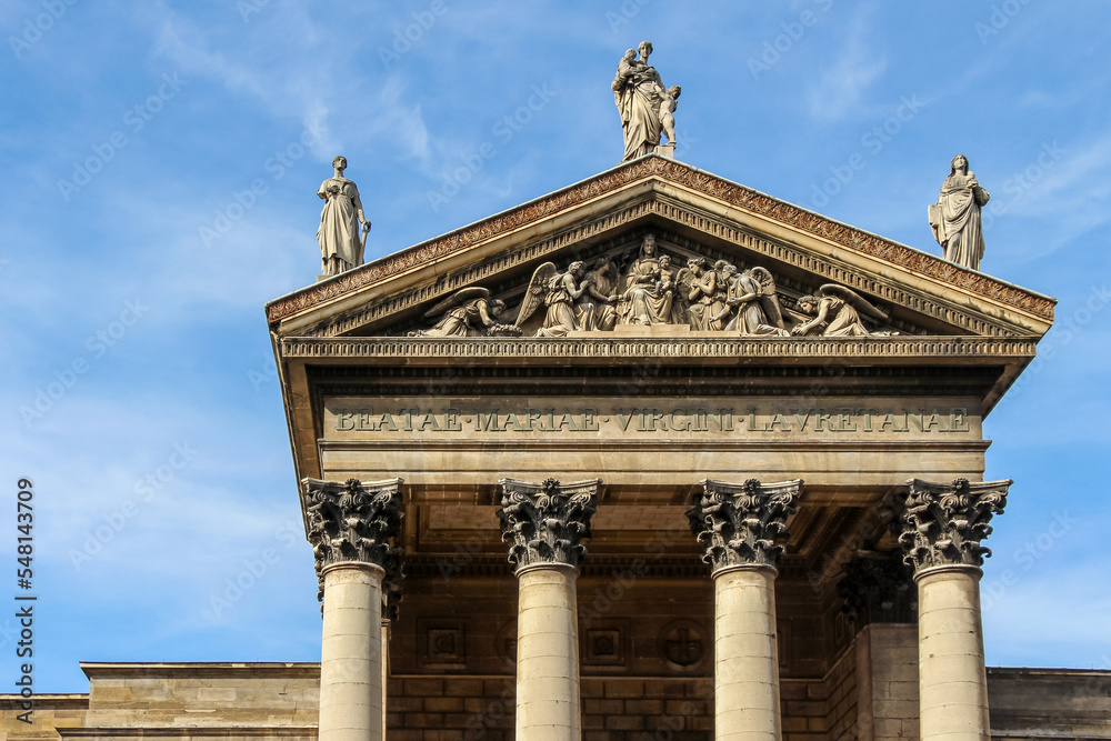 Church Notre-Dame de Lorette on  sunny day, Paris, France (the latin wrinting means 