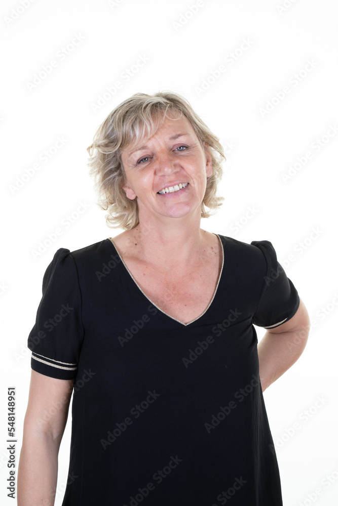 happy blond senior woman smiling standing at isolated white background happy blond senior woman smiling standing at isolated white background