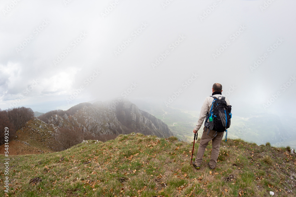 Hiker on the summit of a mountain Palombara in matese park Hiker on the summit of a mountain Palombara in matese park