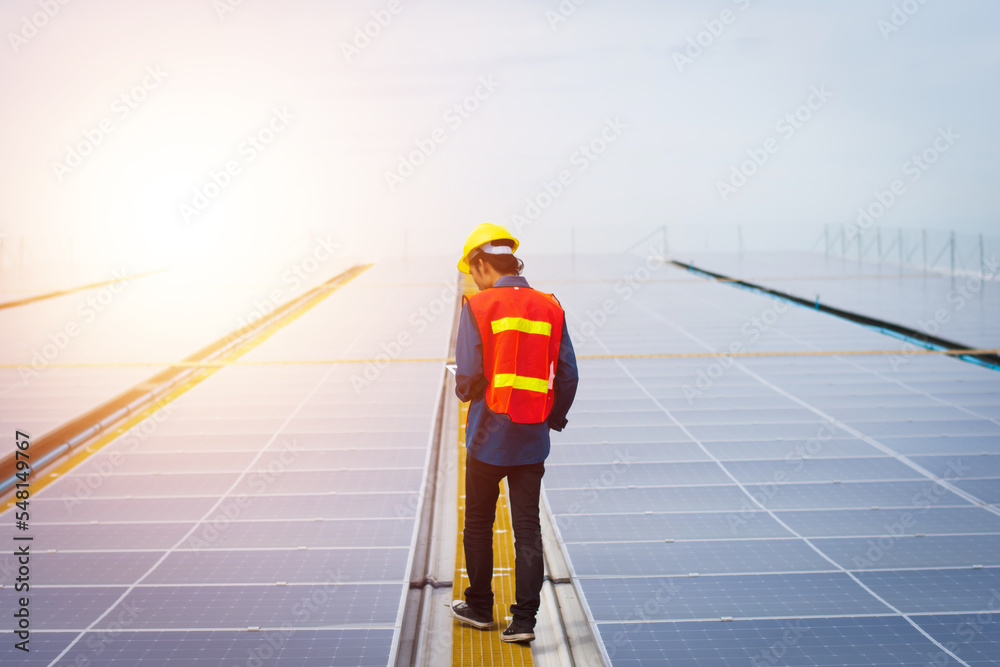 custom made wallpaper toronto digitalPhotovoltaic Technology, Service Engineer Checking Solar Rooftop Installation of Factory Morning Silhouette Technician Checking and Repairing Solar Rooftop of Factory.