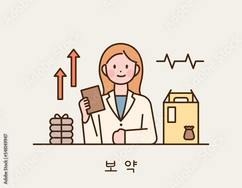 An oriental doctor is explaining while holding a herbal medicine in her hand. She has a packed medicine box and pocket next to her.