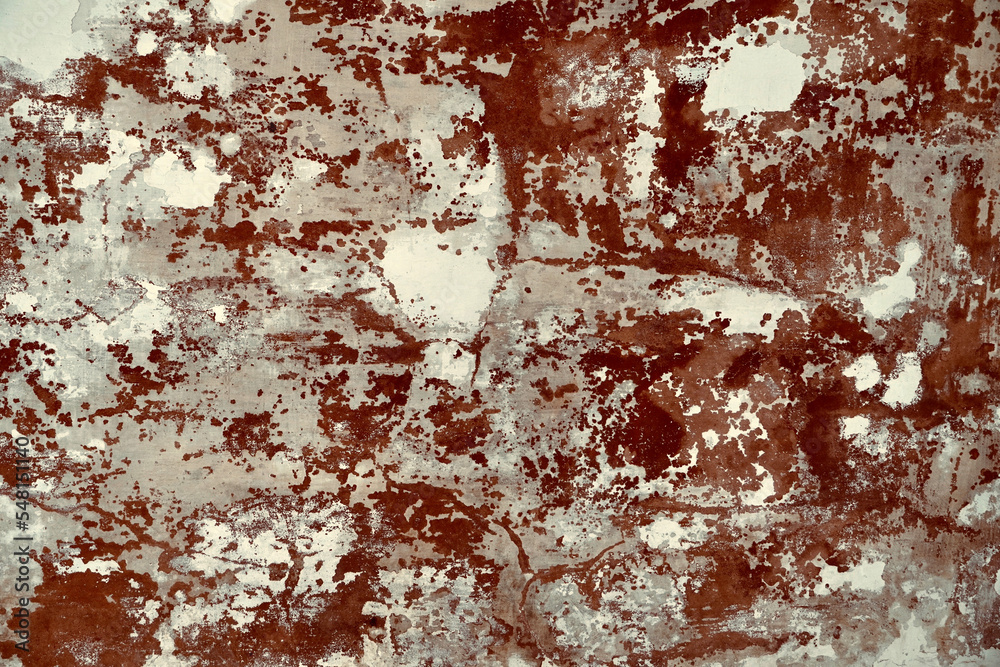 Naklejka premium Paint peel off in wall. Old rusty texture.