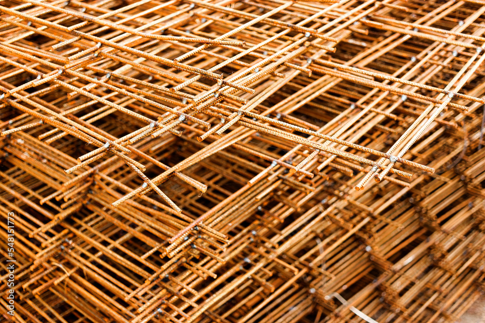 Rebar, reinforcing bars or steel close up, reinforcement steel, wires mesh of steel used as a tension device in reinforced concrete. Rebar, reinforcing bars or steel close up, reinforcement steel, wires mesh of steel used as a tension device in reinforced concrete.