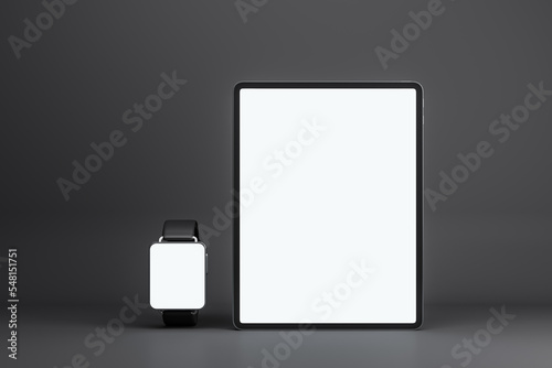 Front view on blank white modern digital tablet and smart watches screens with place for your logo or text on dark grey background. 3D rendering  mockup