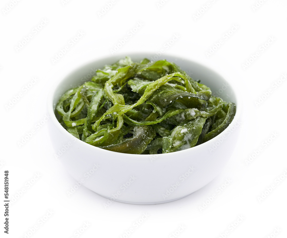 heap of fresh Korean salted seaweed salad stem side dish or Miyeok Julgi Bokkeum in white bowl isolated on white background. Laminaria or Kelp Seaweed stem heap of fresh Korean salted seaweed salad stem side dish or Miyeok Julgi Bokkeum in white bowl isolated on white background. Laminaria or Kelp Seaweed stem