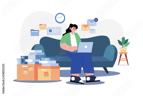 Woman Employee Working From Home While Seating On The Couch