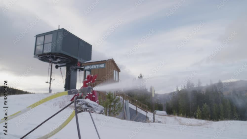 Shot of snow making machine at ski resort in colorado in winter making snow Shot of snow making machine at ski resort in colorado in winter making snow