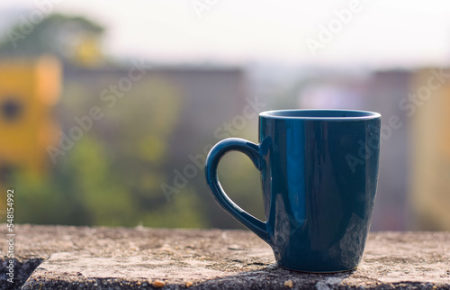 Closeup of a Morning Coffee with a Blue Coffee Mug