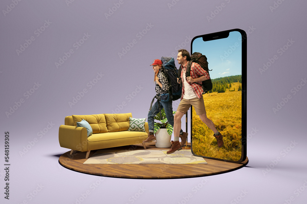 Happy young couple, smiling man and woman going to summer vacation trip using 3d model of phone isolated on grey background. - obrazy, fototapety, plakaty 