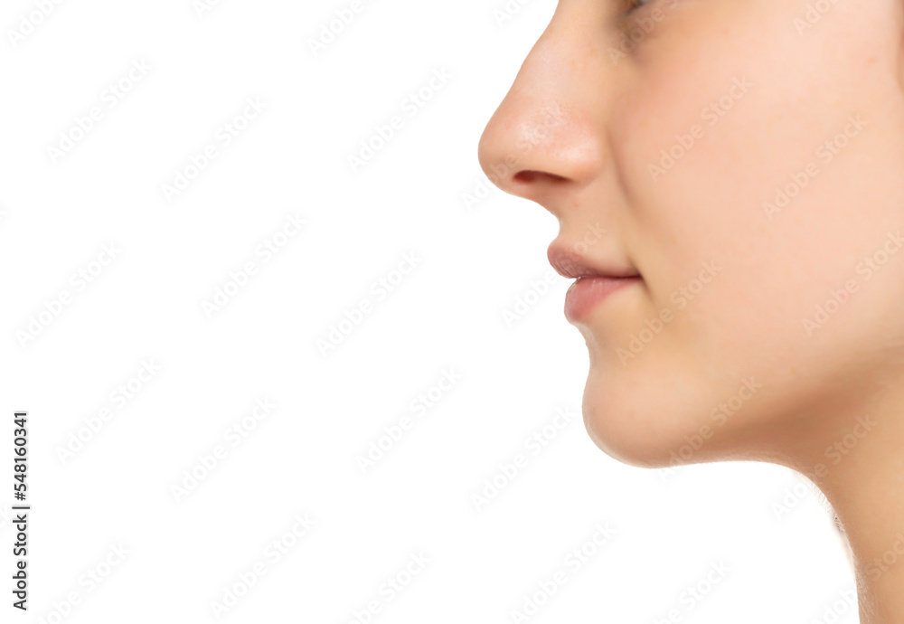 Closeup profile of female s nose and lips with no makeup on a white background Closeup profile of female s nose and lips with no makeup on a white background