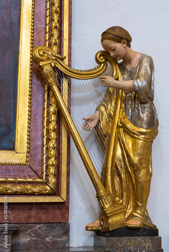 Solothurn, Switzerland - July 12, 2022: Statue of Saint Cecilia, patron saint of church music, in Solothurn Cathedral, Switzerland