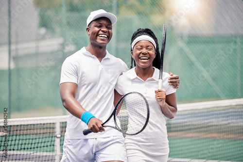 Friends, tennis and happy smile, fitness and racket after sport training, workout and practice at outdoor. Black man, woman and athlete couple, happiness and sports practice on tennis court together © L Ismail/peopleimages.com
