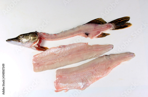 How to make pike fillets with a knife. process on a white background