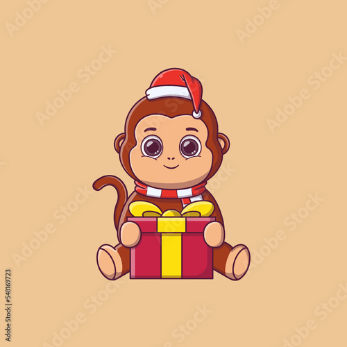 cute monkey sitting and holding big gift box