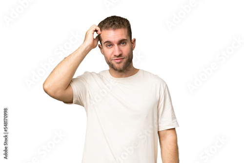 Young handsome caucasian man isolated on green chroma background with an expression of frustration and not understanding