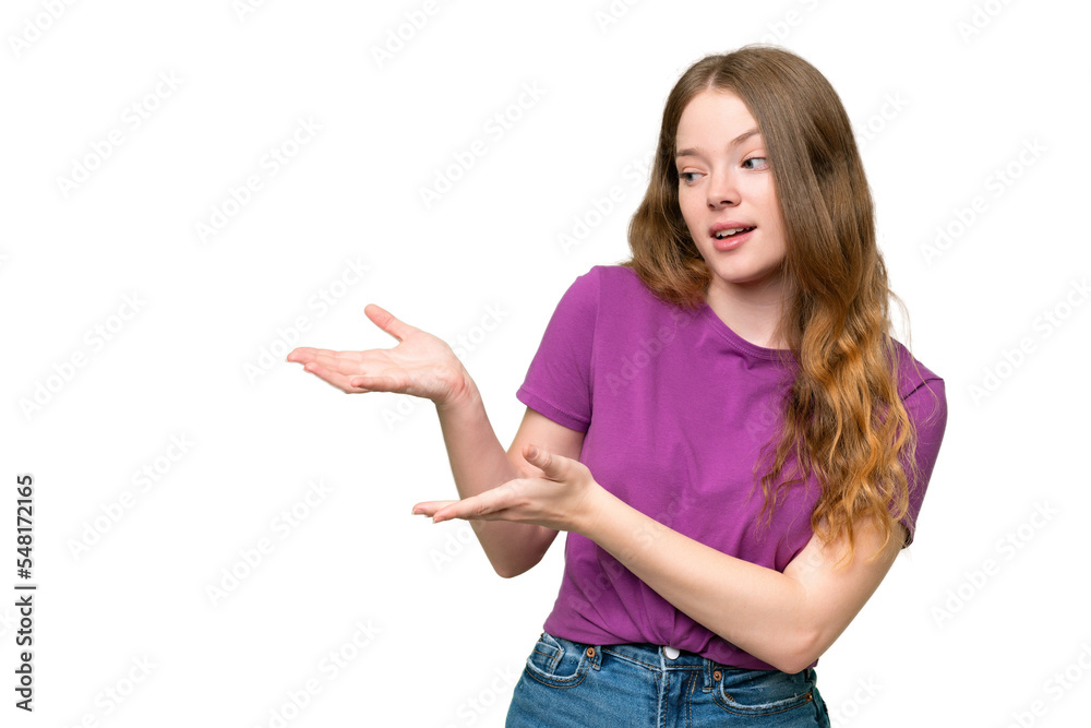 Young pretty woman over isolated background with surprise expression while looking side Young pretty woman over isolated background with surprise expression while looking side