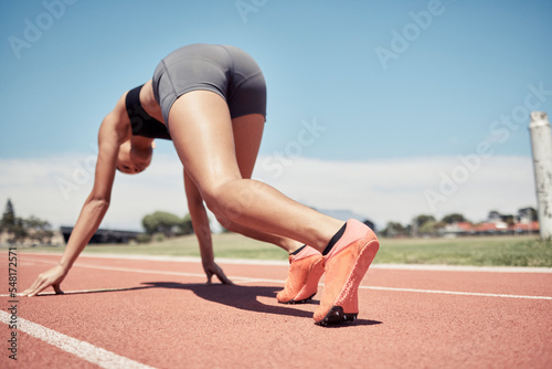 Runner, start and race track, woman and sport with fitness outdoor and training for marathon or relay, cardio at stadium. Run, running and exercise, body workout and active, healthy lifestyle.