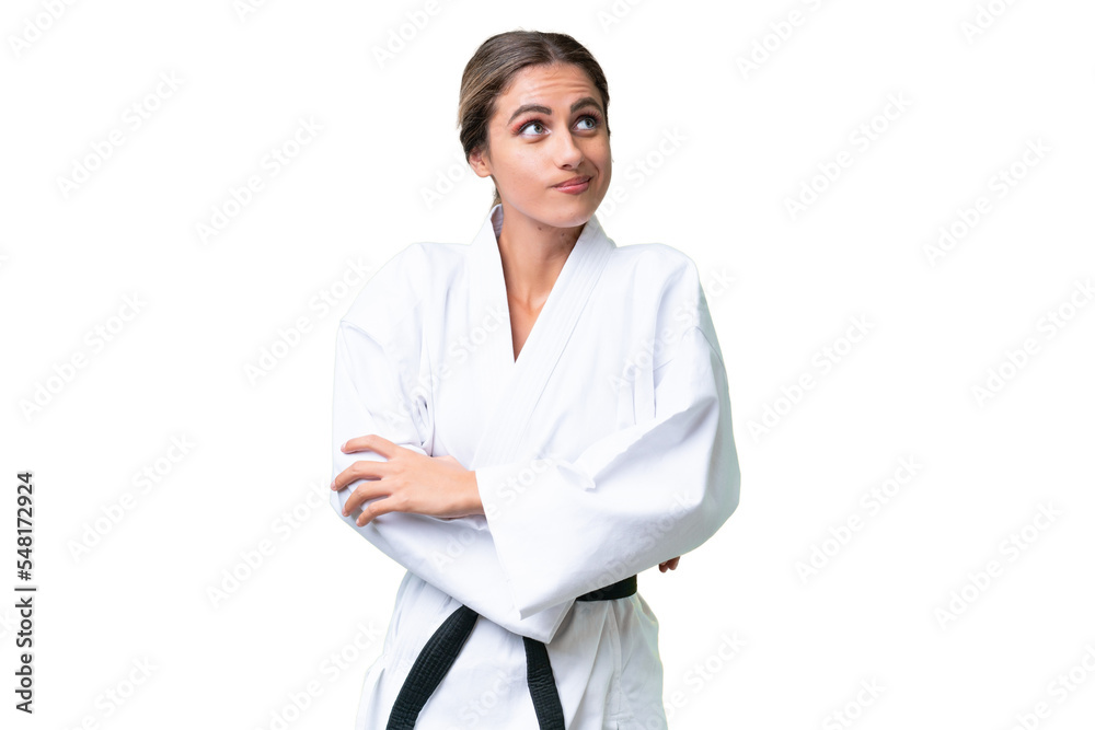 Young Uruguayan woman over isolated background making doubts gesture while lifting the shoulders Young Uruguayan woman over isolated background making doubts gesture while lifting the shoulders